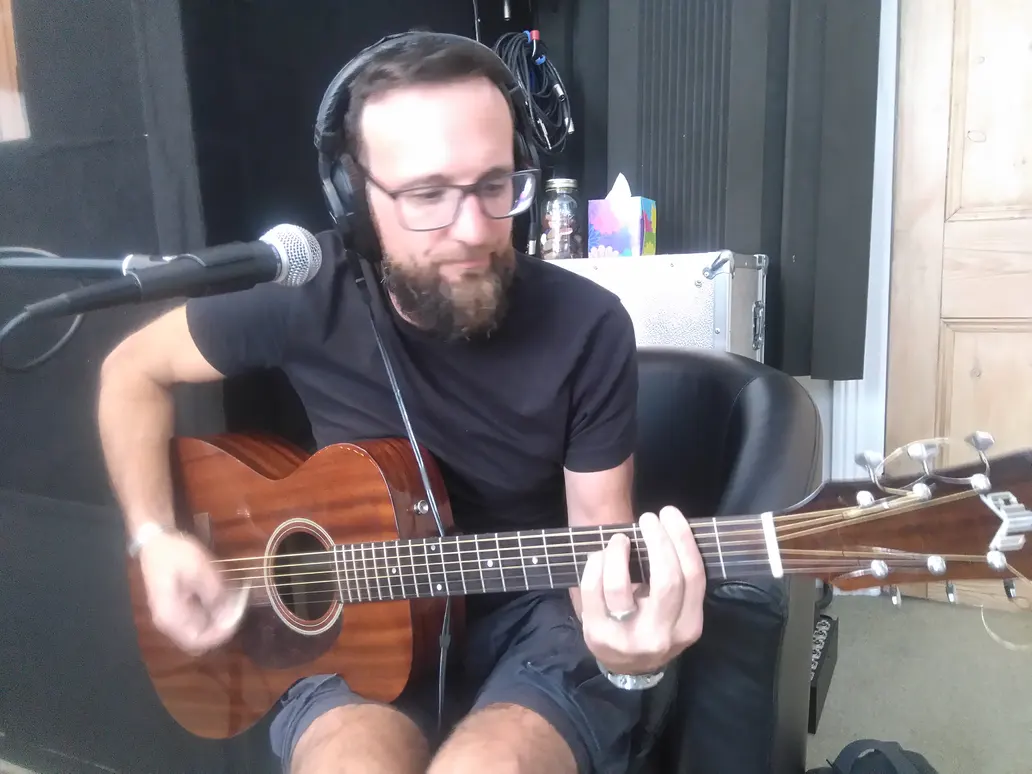 Guy Malkerson playing guitar